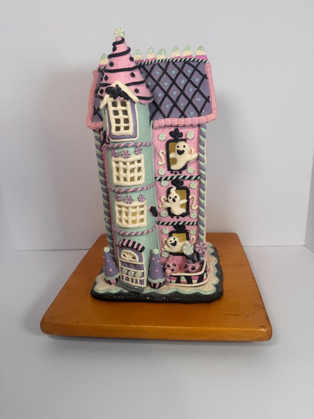 Halloween Pastel Gingerbread House Haunted with white ghost
